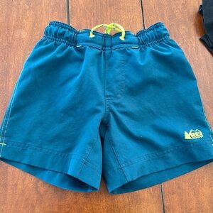 Boys REI XXS blue swim trunks with adjustable drawstring